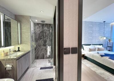 View of connected bathroom and bedroom