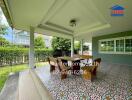 Outdoor patio with dining table and chairs