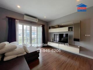 Living room with modern decor and wooden flooring