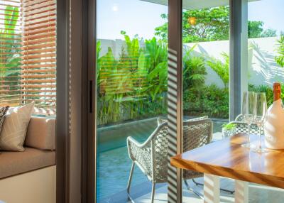 Modern living area with pool view