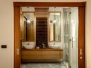 Modern bathroom with wooden accents and double sink