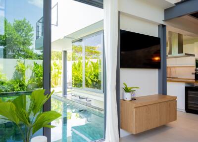 Modern living area with pool view