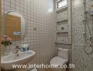 Modern white bathroom with shower and wooden flooring