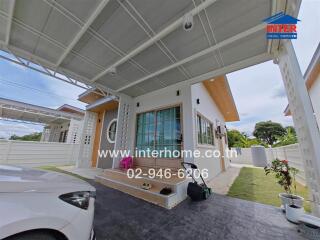 Exterior view of house with covered carport