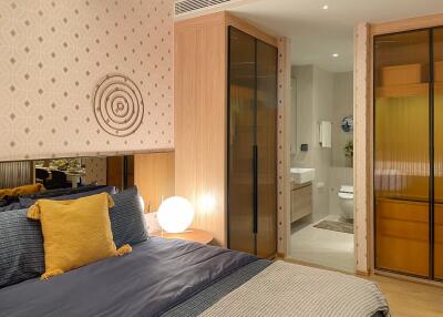 Cozy bedroom with modern decor and en-suite bathroom