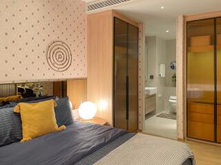 Cozy bedroom with modern decor and en-suite bathroom