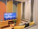 Modern living room with a TV and stylish decor