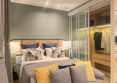 Modern bedroom with open wardrobe and stylish decor