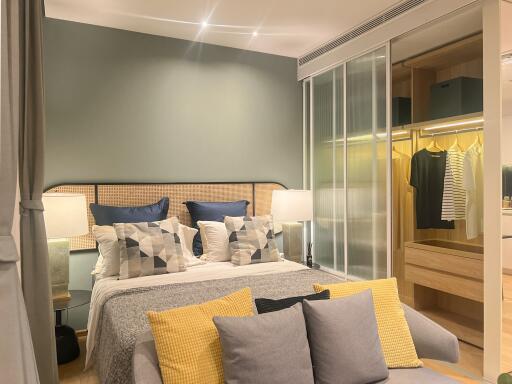 Modern bedroom with open wardrobe and stylish decor