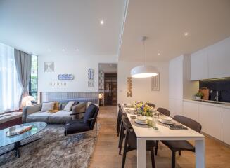 Modern living room with dining area and kitchen