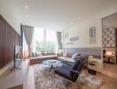 Modern living room with floor-to-ceiling windows and contemporary decor