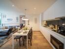 Modern open-plan dining and kitchen area with sleek design