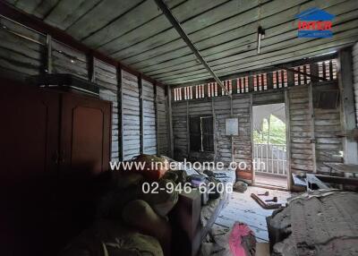 old wooden room with furniture and clutter