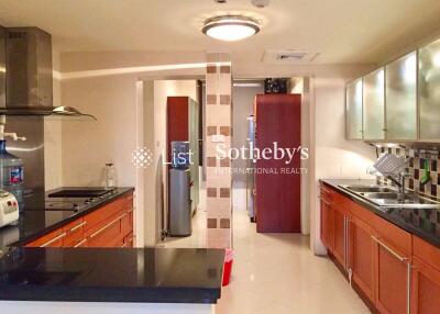 Modern kitchen with built-in appliances and ample counter space