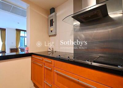 Modern kitchen with sleek stainless steel appliances and wooden cabinets