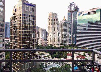 View from balcony overlooking city skyline