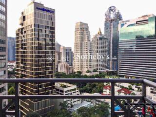 View from balcony overlooking city skyline