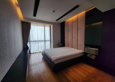 Modern bedroom with large window