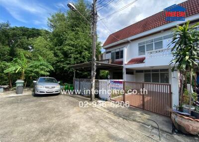 Exterior view of a residential property with driveway and garden