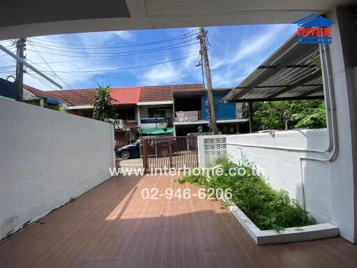 House front yard with paved area