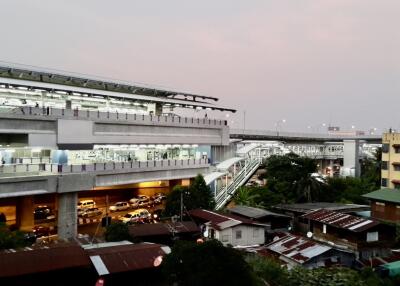 View of a nearby public transportation station and surrounding buildings