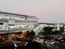 View of a nearby public transportation station and surrounding buildings