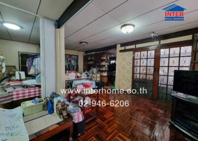 Living room with wooden flooring and furniture