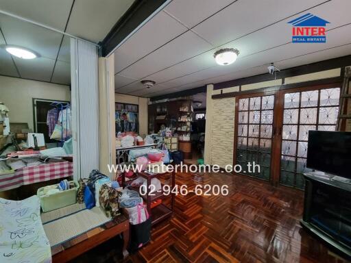 Living room with wooden flooring and furniture