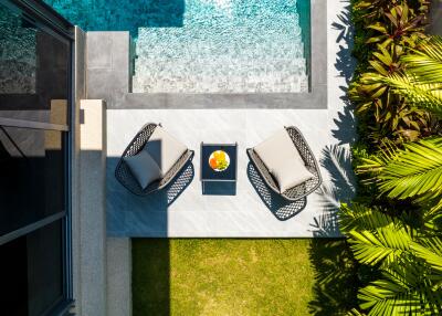 Outdoor seating area by the pool