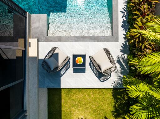 Outdoor seating area by the pool