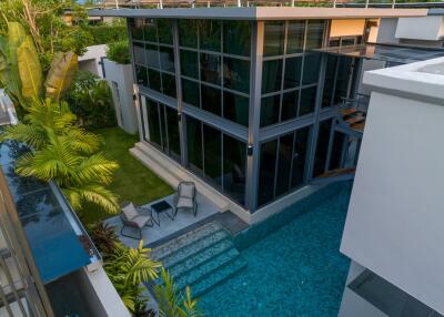 Modern two-story building with pool