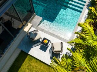 Outdoor area with pool and seating