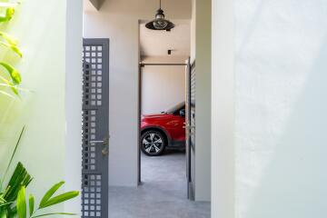 Garage view with a car