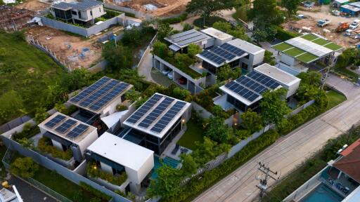 Aerial view of modern homes with solar panels