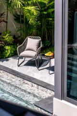 Outdoor seating area by the pool