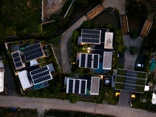 Aerial view of modern buildings with solar panels