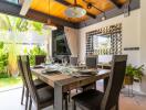 Modern dining room with wooden ceiling and large windows