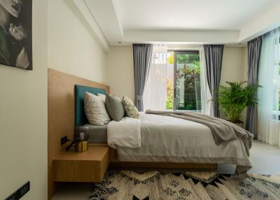 Well-lit bedroom with modern decor