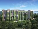 Modern apartment building with green facades surrounded by lush greenery