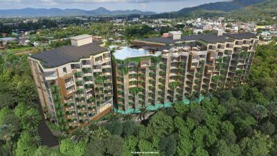 Arial view of a modern residential building surrounded by greenery with a rooftop pool