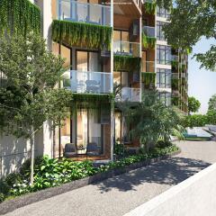 Modern apartment building with greenery and balconies