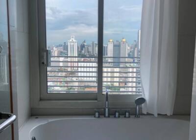 Bathroom with skyline view