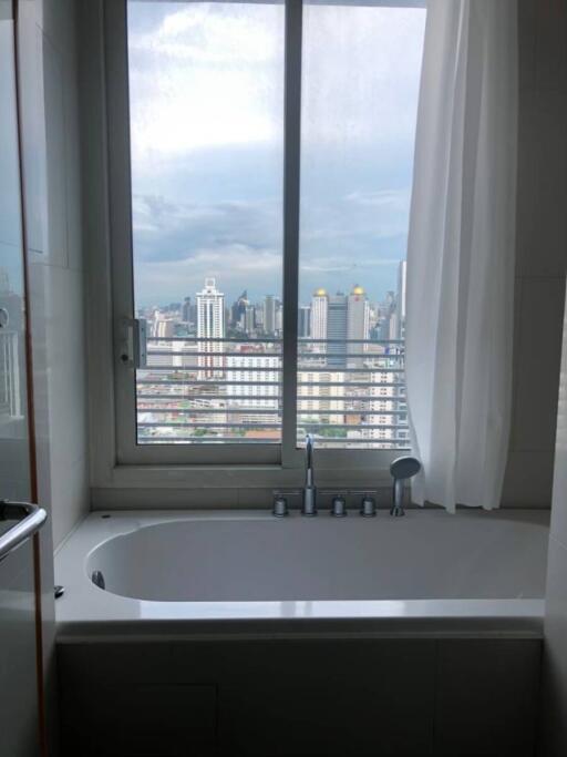 Bathroom with skyline view