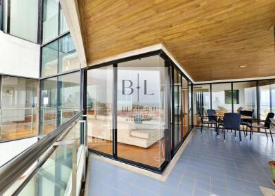 Spacious living area with glass walls