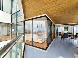 Spacious living area with glass walls