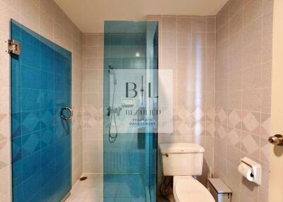 Modern bathroom with glass shower enclosure