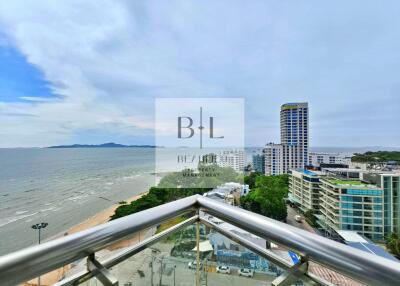 View from the balcony overlooking the beach and cityscape