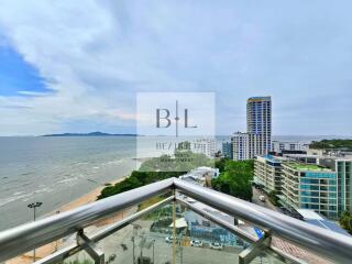 View from the balcony overlooking the beach and cityscape