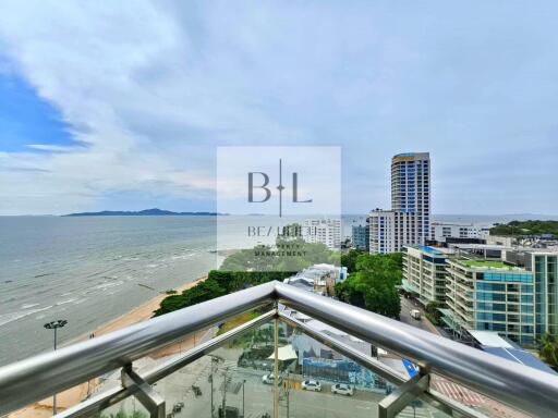 View from the balcony overlooking the beach and cityscape