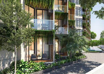 Exterior view of a modern residential building with balconies and greenery